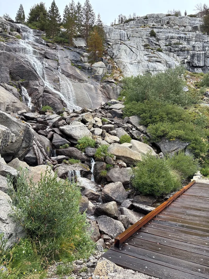 Bridge and waterfall along Dusy Branch Creek.